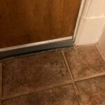 Door with door sweep